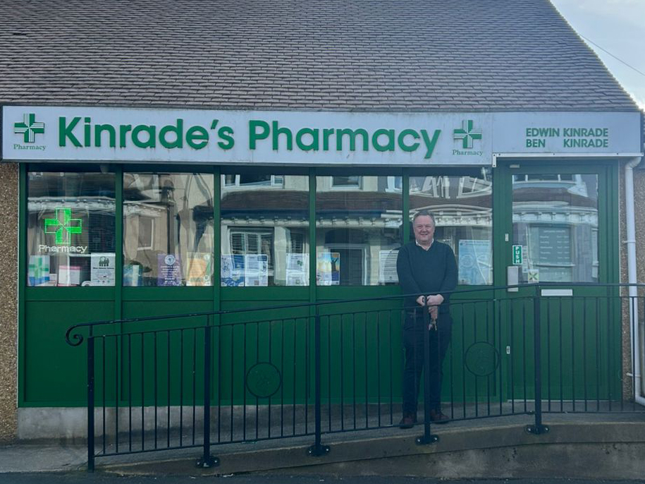 Edwin Kinrade outside Kinrade's Pharmacy